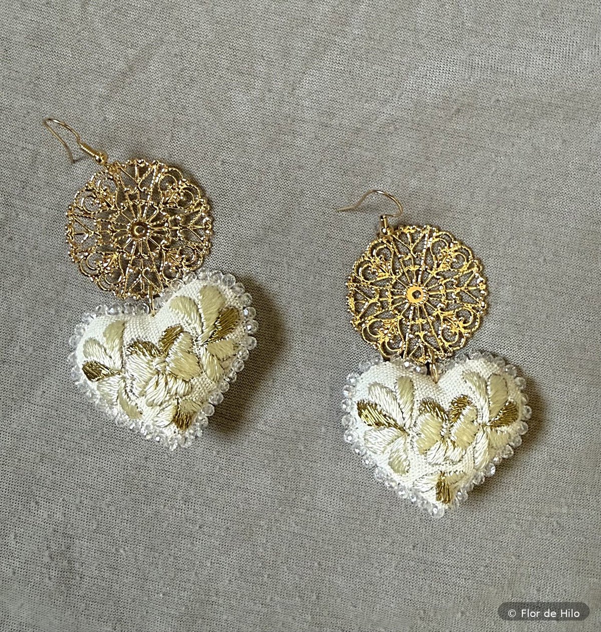 Hand-embroidered heart earrings in cream